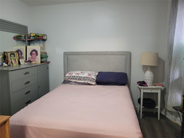 bedroom featuring wood-type flooring