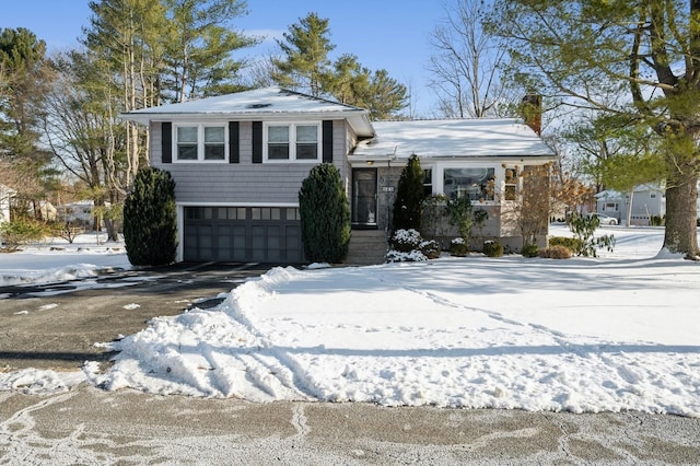 tri-level home featuring a garage