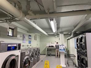 laundry area with washer and clothes dryer