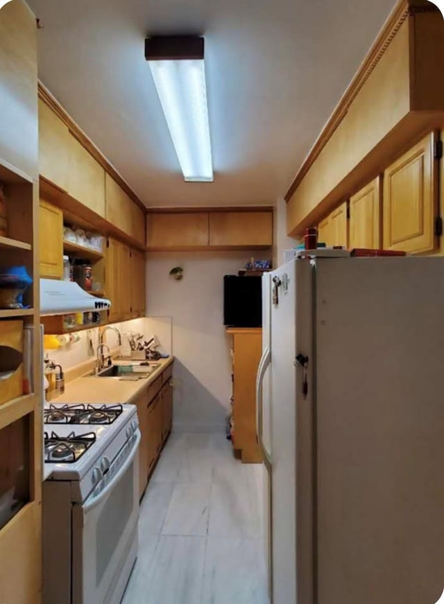 kitchen featuring sink, white appliances, and ornamental molding