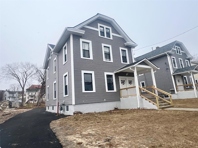 view of property with covered porch