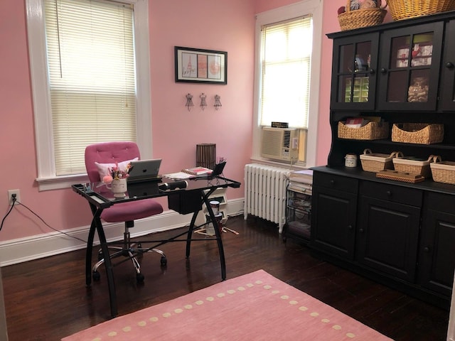 office area with radiator, cooling unit, and dark hardwood / wood-style floors