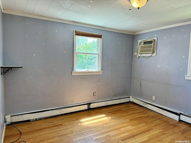 spare room with light hardwood / wood-style flooring, a baseboard heating unit, crown molding, and a wall unit AC