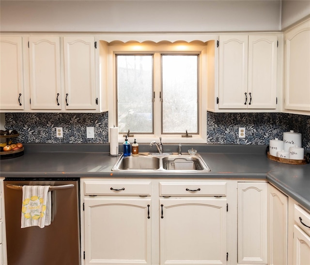 kitchen with sink, backsplash, and dishwasher