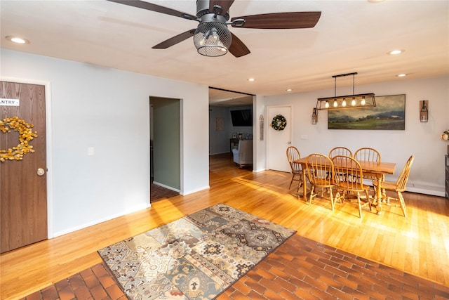 dining room with ceiling fan