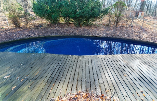 view of pool featuring a deck