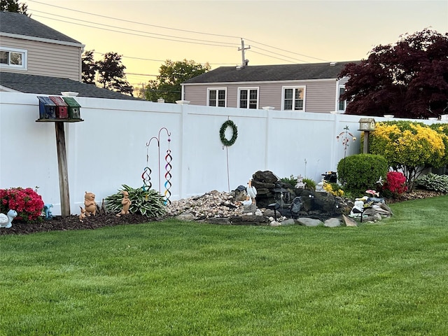 view of yard with fence