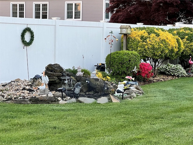 view of yard with fence