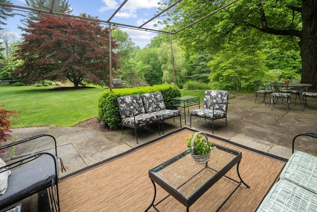view of patio with an outdoor hangout area and outdoor dining space