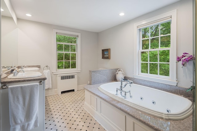 full bath featuring radiator heating unit, plenty of natural light, tile patterned floors, a jetted tub, and recessed lighting