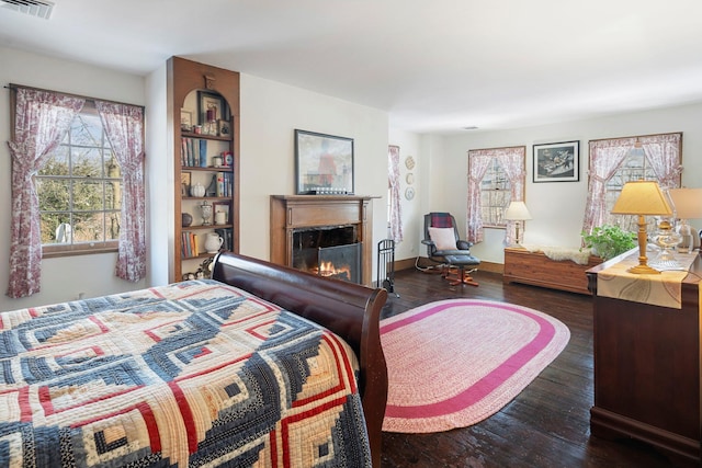 bedroom featuring dark hardwood / wood-style flooring