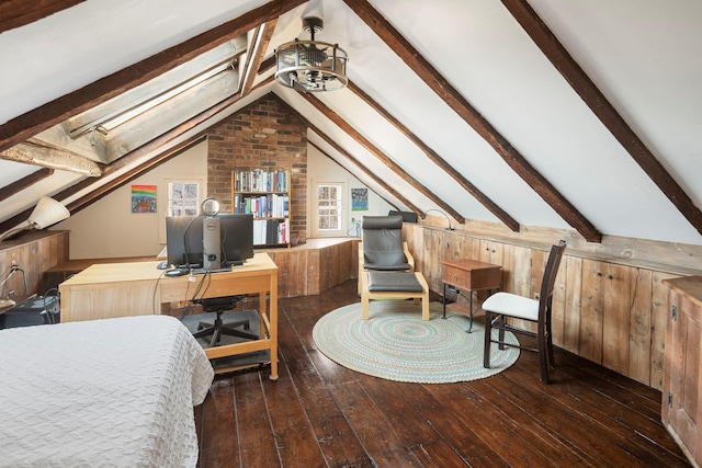 bedroom featuring dark wood-type flooring, lofted ceiling with skylight, and wood walls