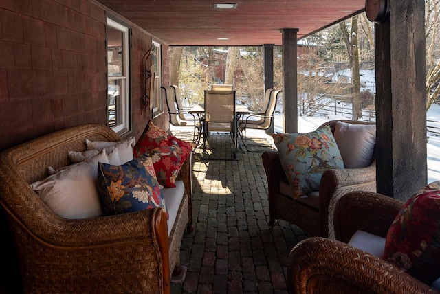 sunroom with wooden ceiling