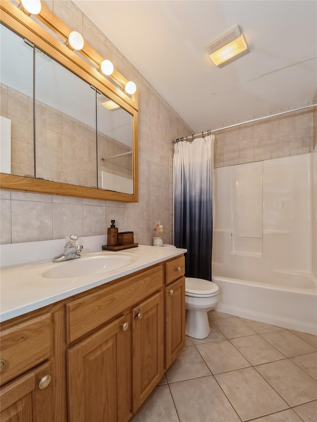 full bathroom with toilet, tile walls, vanity, shower / bath combo with shower curtain, and backsplash