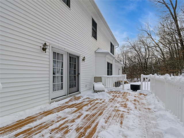 view of snow covered deck