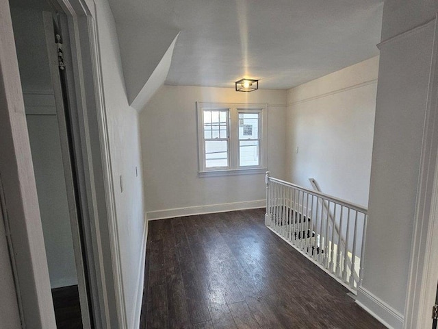 bonus room featuring dark hardwood / wood-style floors