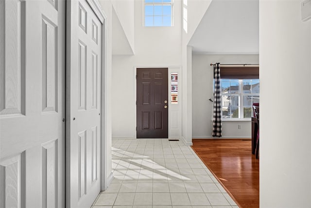 foyer entrance with light hardwood / wood-style floors