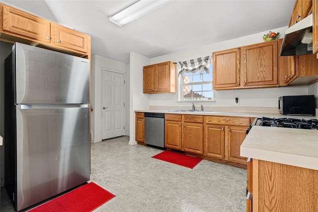 kitchen with appliances with stainless steel finishes and sink