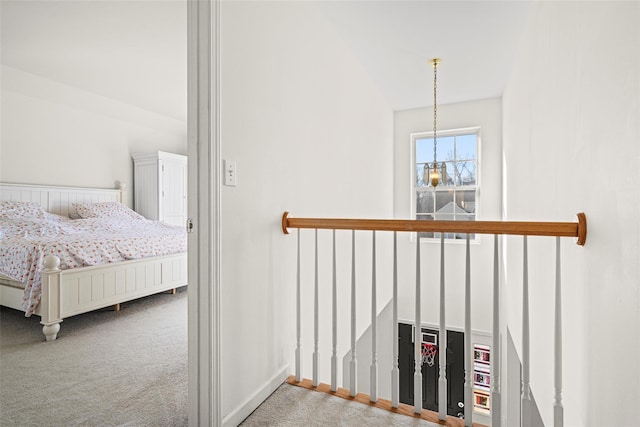 carpeted bedroom with vaulted ceiling