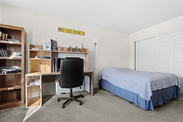 carpeted bedroom with a closet