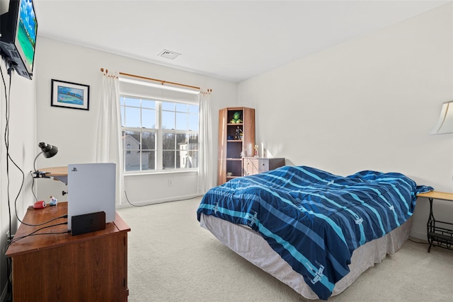 bedroom featuring carpet