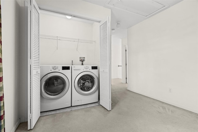 laundry room with independent washer and dryer