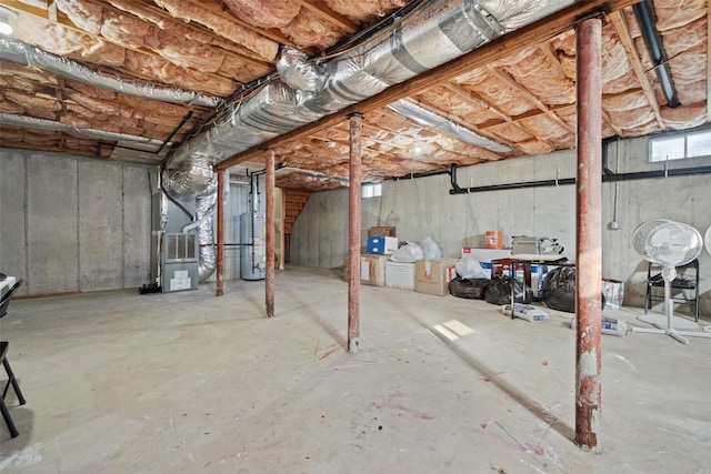 basement with heating unit and water heater