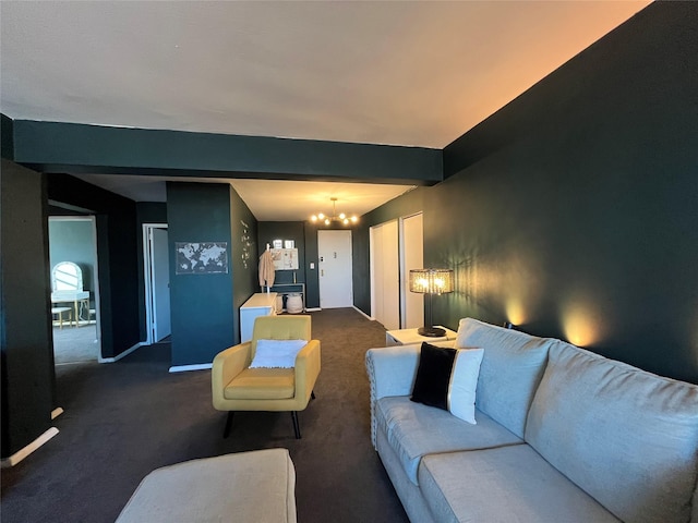 living room featuring a chandelier and dark colored carpet