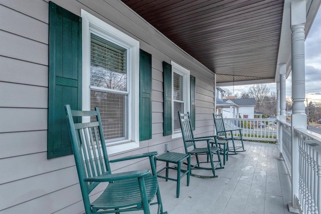 balcony featuring a porch