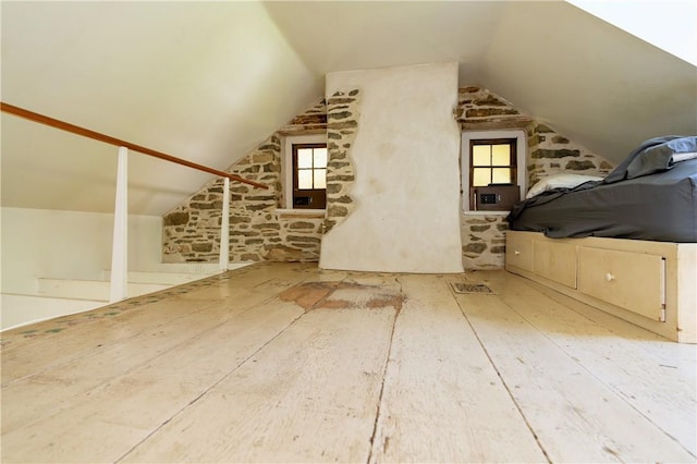 additional living space with lofted ceiling and plenty of natural light