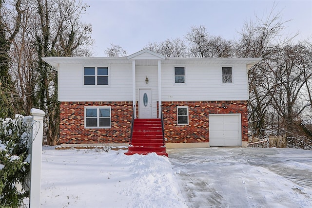 split foyer home featuring a garage