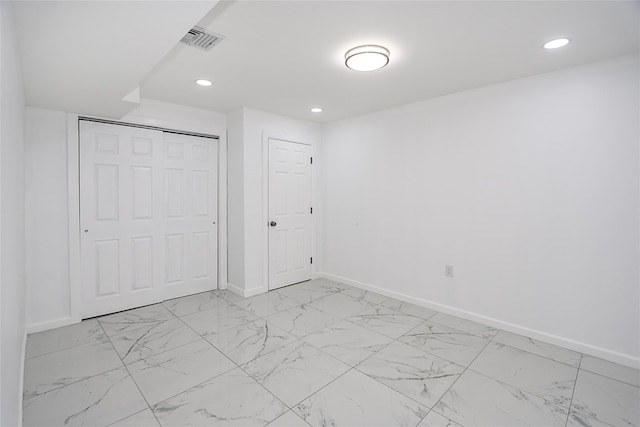 unfurnished bedroom featuring a closet