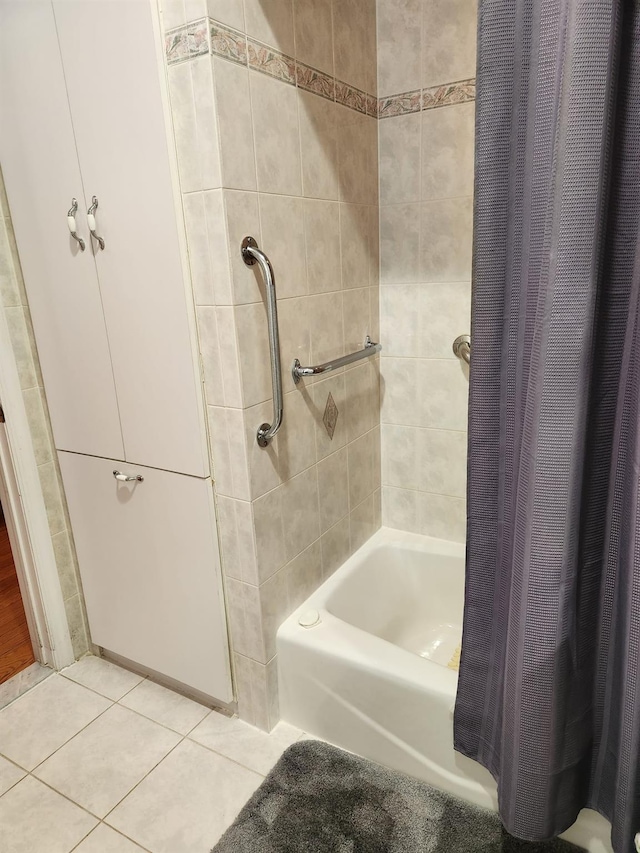 bathroom featuring tile patterned floors and shower / tub combo