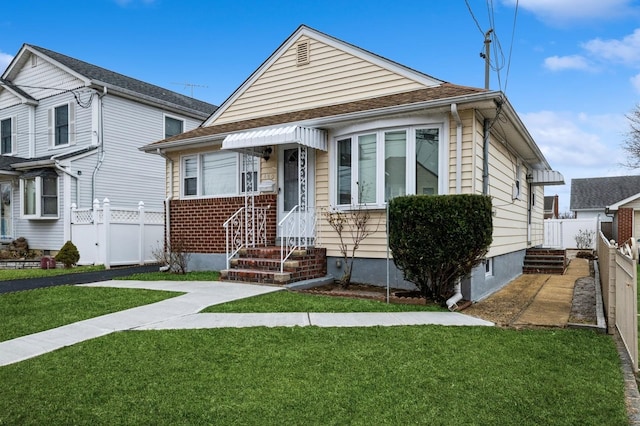 bungalow with a front yard