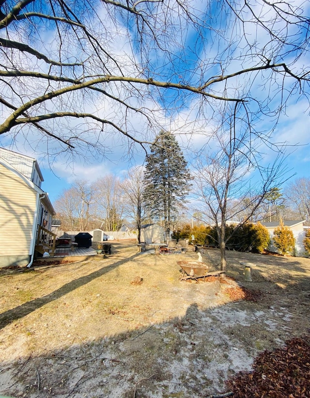 view of yard featuring a deck