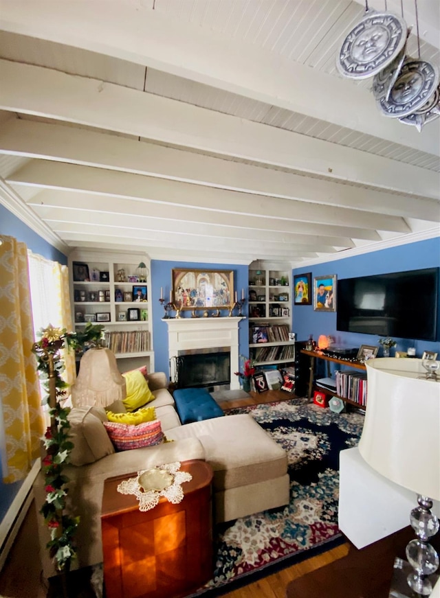 living room with wooden ceiling, built in shelves, beamed ceiling, and hardwood / wood-style floors