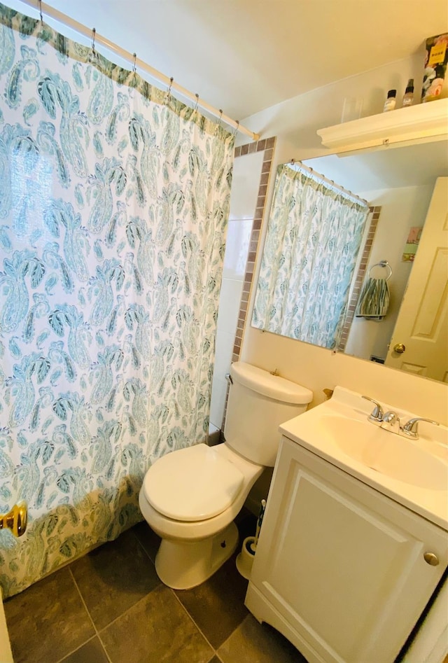 full bathroom with toilet, vanity, and shower / tub combo with curtain