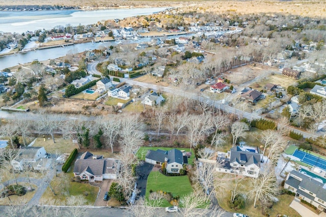 aerial view featuring a water view and a residential view