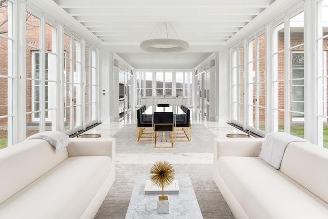 sunroom featuring plenty of natural light