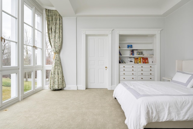 bedroom with light colored carpet