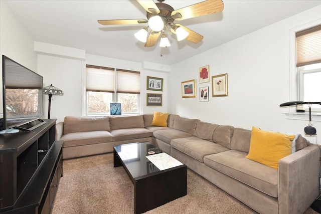 living room with carpet and ceiling fan