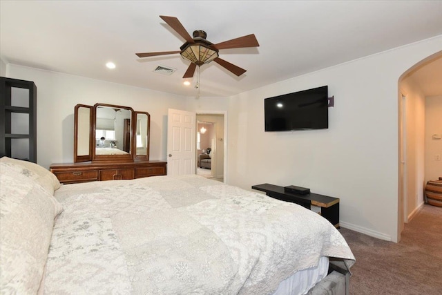 carpeted bedroom with ceiling fan