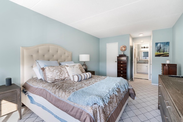 bedroom featuring connected bathroom