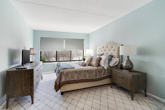 bedroom featuring a textured ceiling