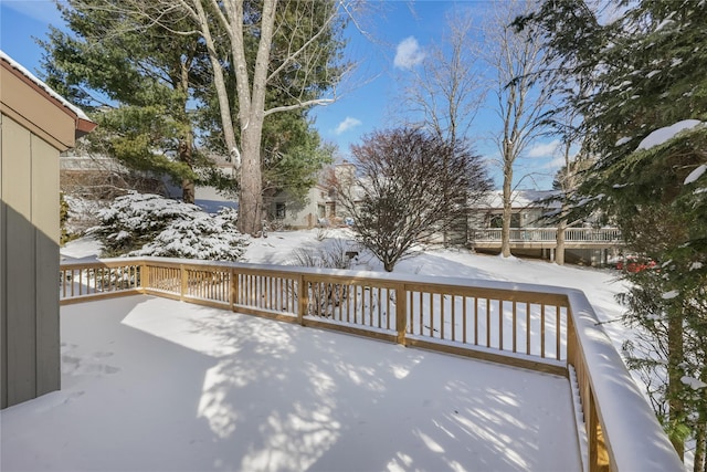 view of snow covered deck