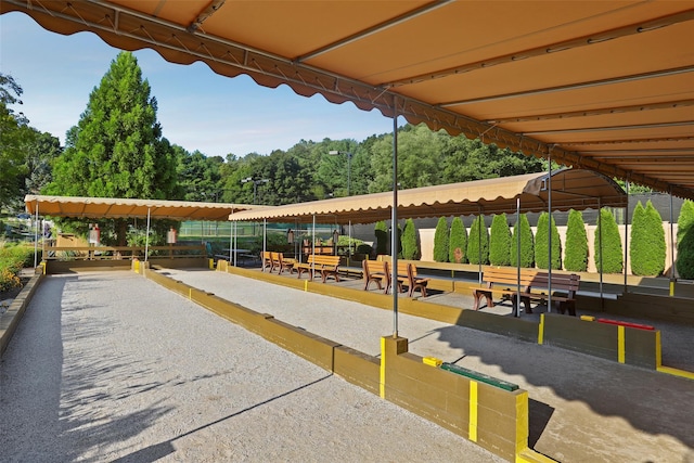 view of property's community with fence