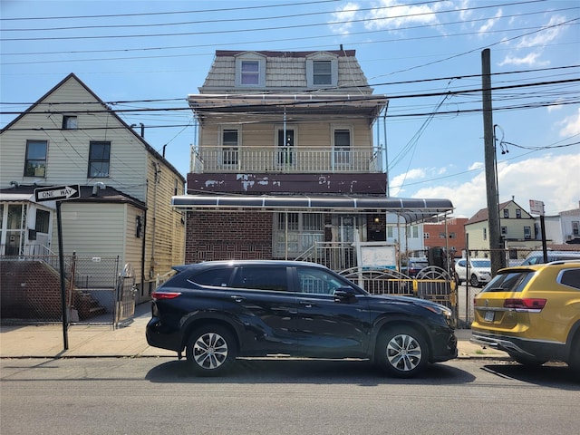 45-24 Burling St, Flushing, NY 11355 - second empire-style home with mansard roof and fence