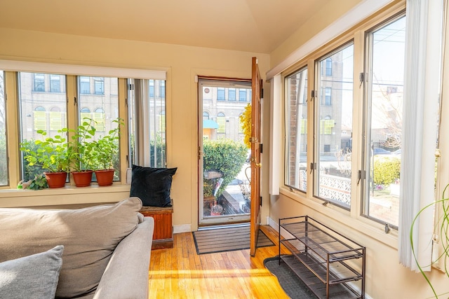 doorway to outside with light hardwood / wood-style floors