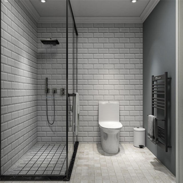 bathroom with radiator, a shower stall, toilet, and crown molding