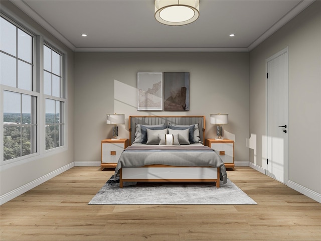 bedroom with baseboards, light wood-type flooring, and crown molding